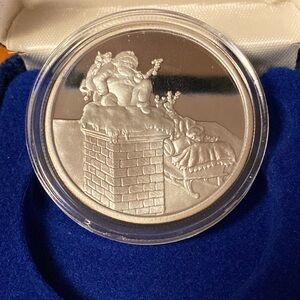 Seasons Greetings Santa in chimney 1999 coin